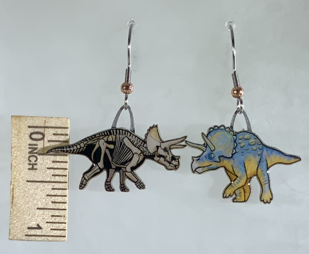 Picture shown is of 1 inch tall pair of earrings of the dinosaur the Triceratops.