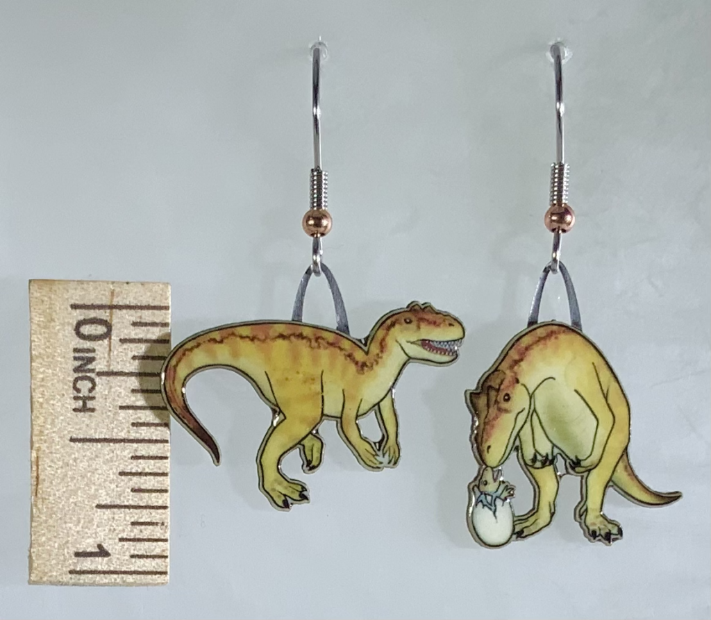 Picture shown is of 1 inch tall pair of earrings of the dinosaur the Allosaurus.