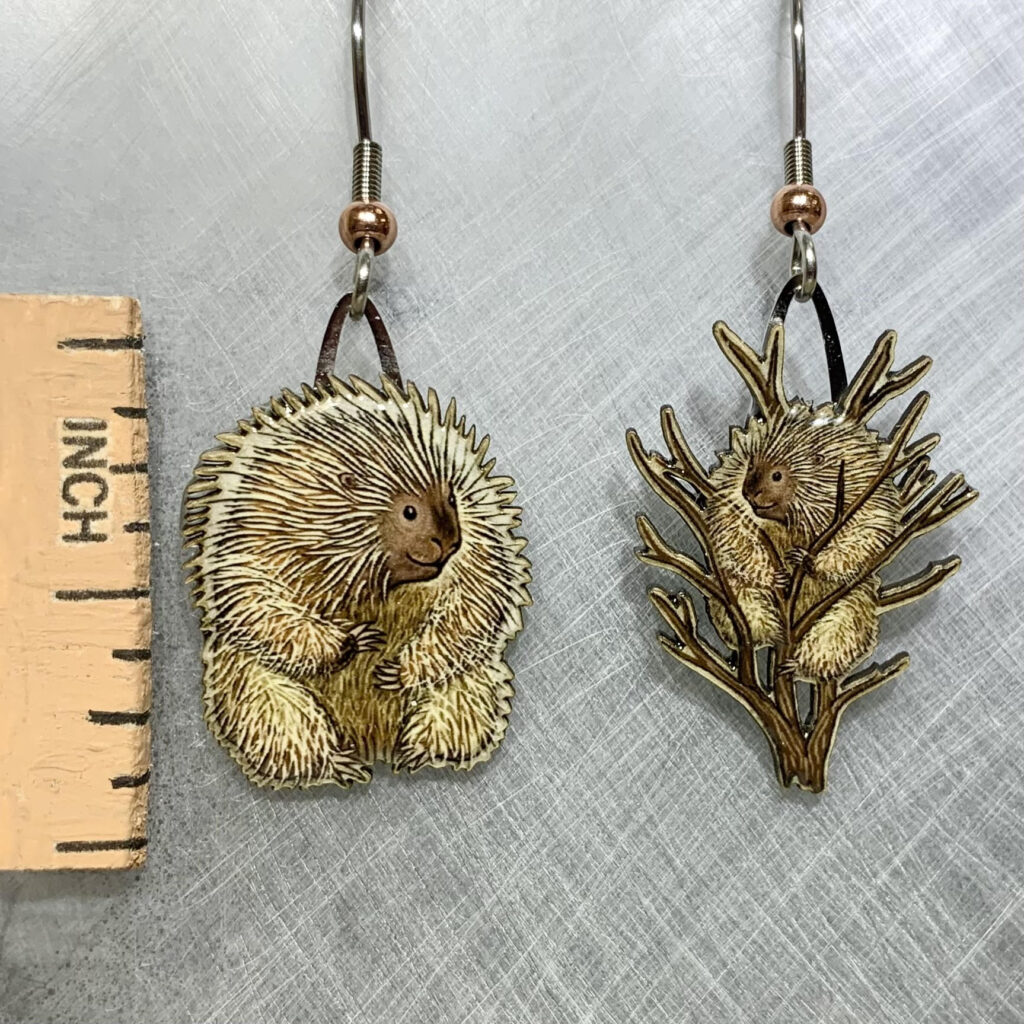 Picture shown is of 1 inch tall pair of earrings of the animal the North American Porcupine.