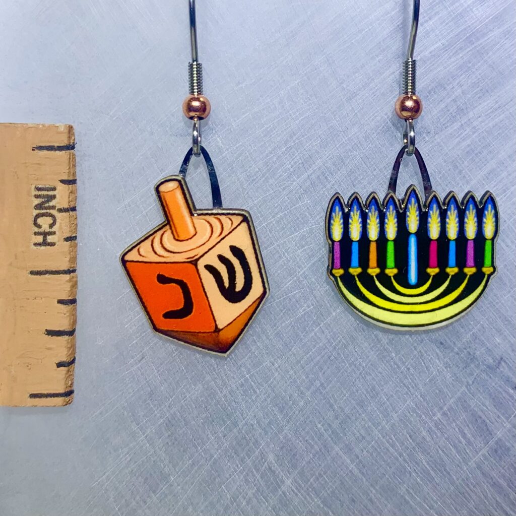 Picture shown is of 1 inch tall pair of earrings of Hanukkah Menorah.