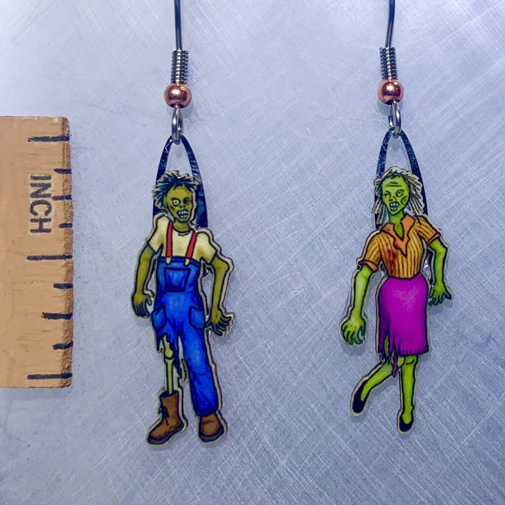 Picture shown is of 1 inch tall pair of earrings of Zombies.