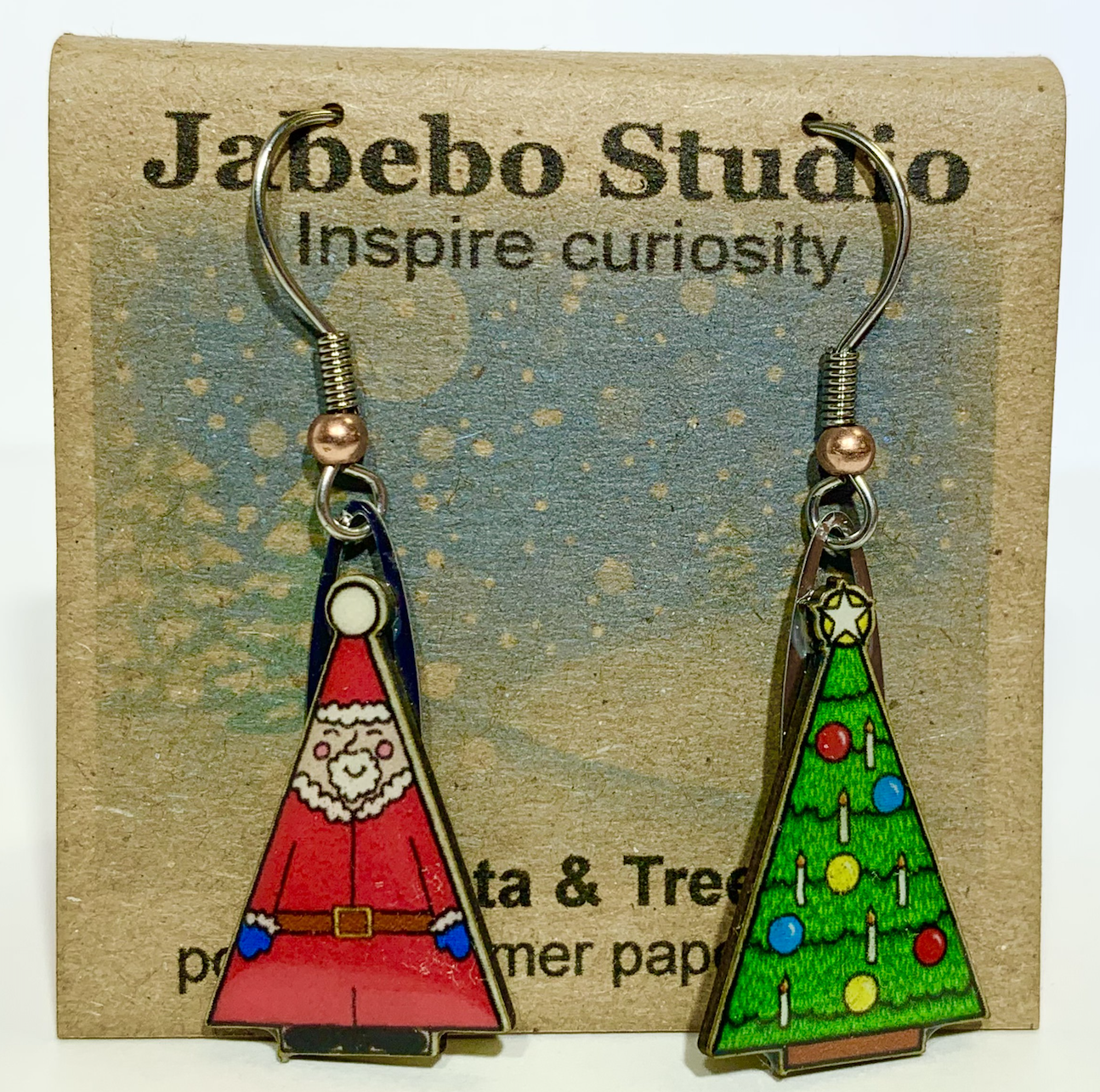 Picture shown is of 1 inch tall pair of earrings of Santa & Tree.