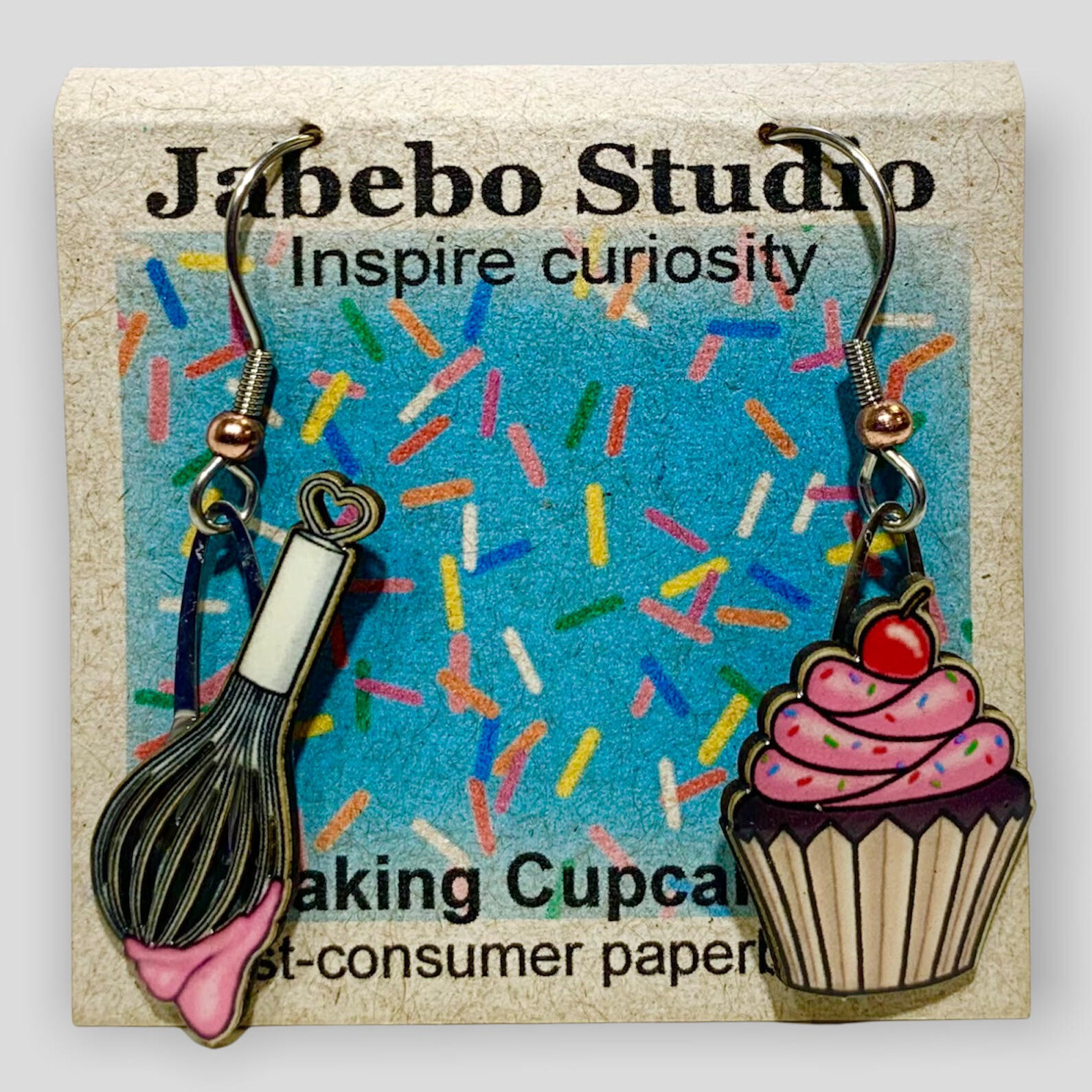 Picture shown is of 1 inch tall pair of earrings of Baking Cupcakes.