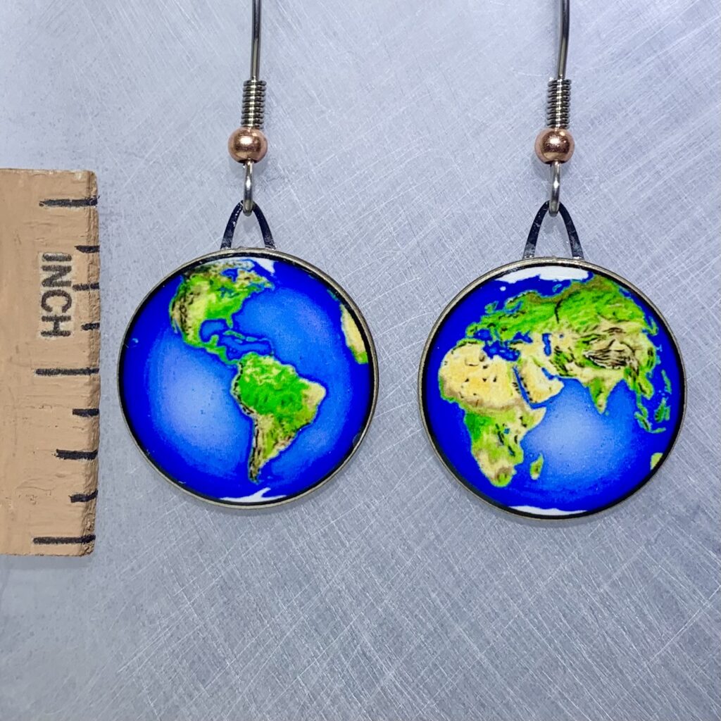 Picture shown is of 1 inch tall pair of earrings of Planet Earth.