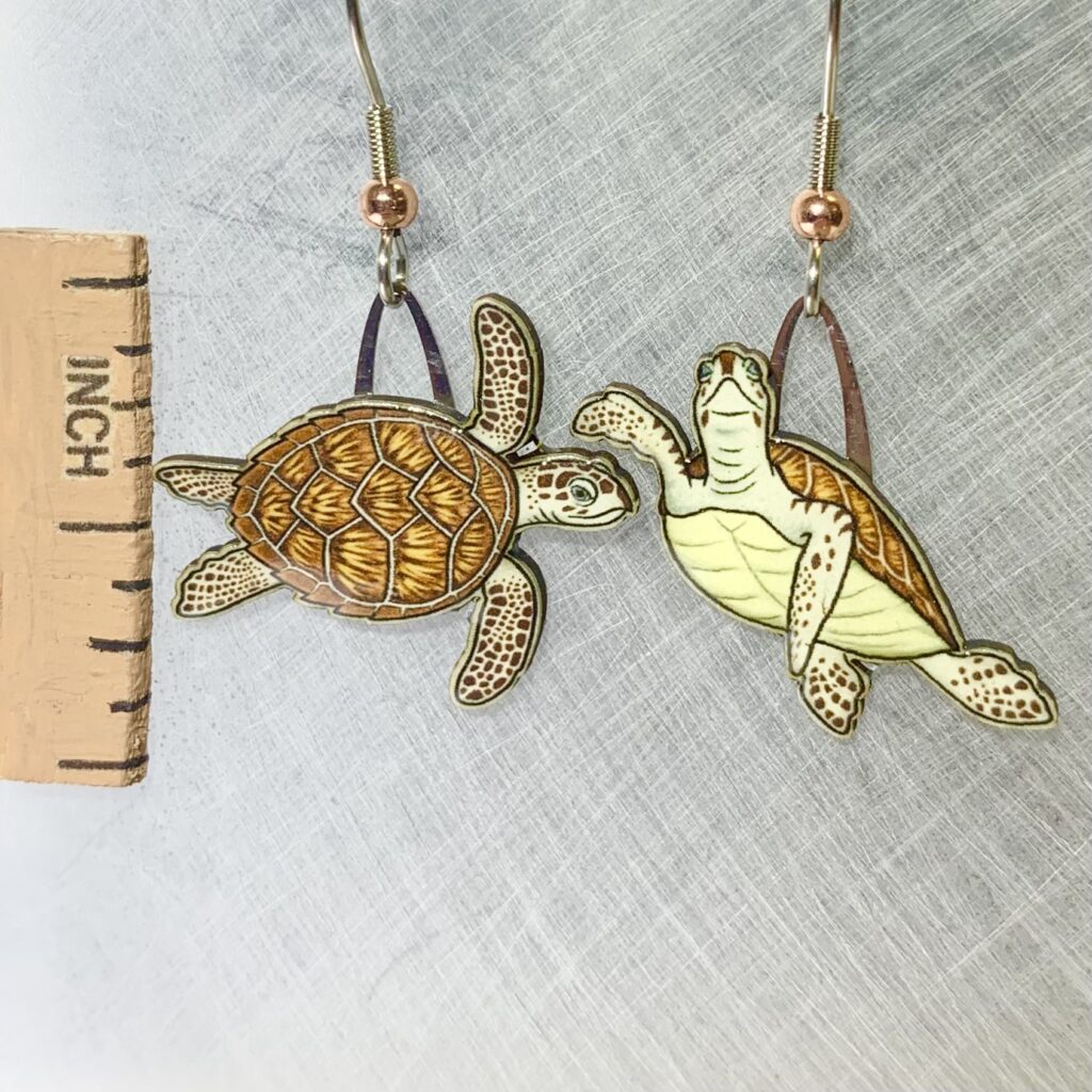 Picture shown is of 1 inch tall pair of earrings of the marine animal the Hawksbill Sea Turtle.