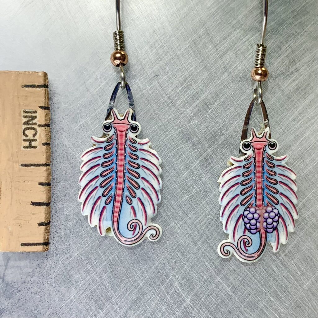 Picture shown is of 1 inch tall pair of earrings of the marine animal the Brine Shrimp.