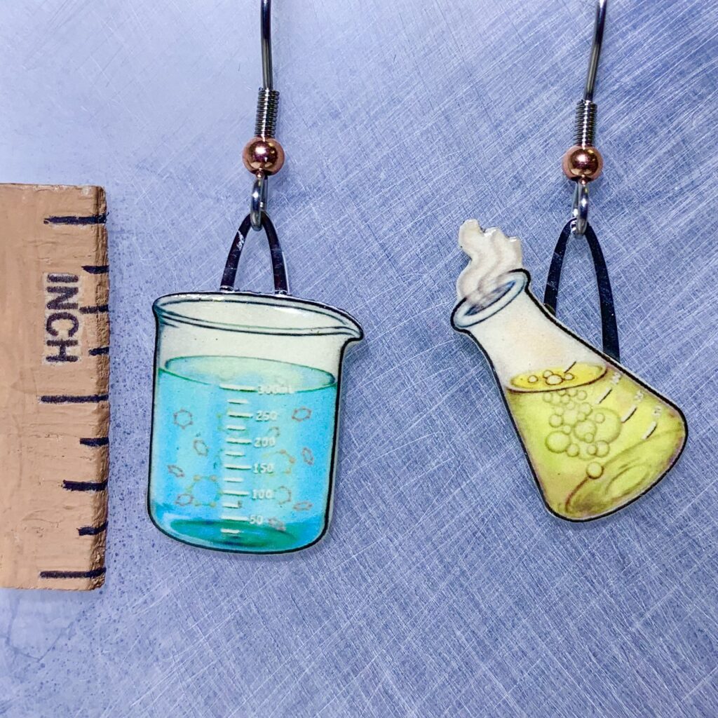 Picture shown is of 1 inch tall pair of earrings of Chemistry Glassware (Blue & Yellow).