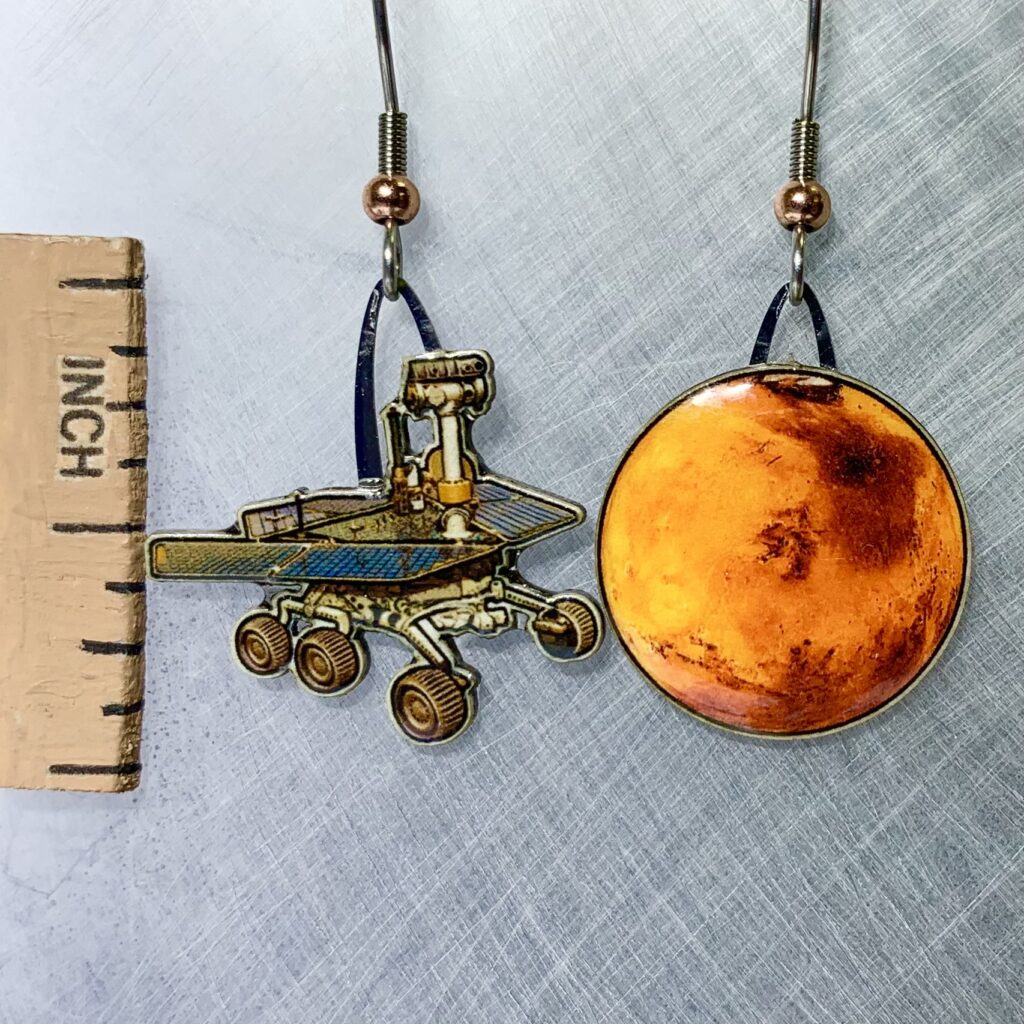 Picture shown is of 1 inch tall pair of earrings of Mars Exploration.