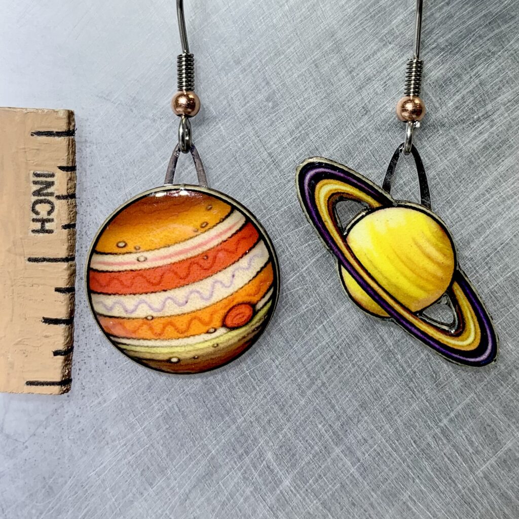 Picture shown is of 1 inch tall pair of earrings of Gas Giants.