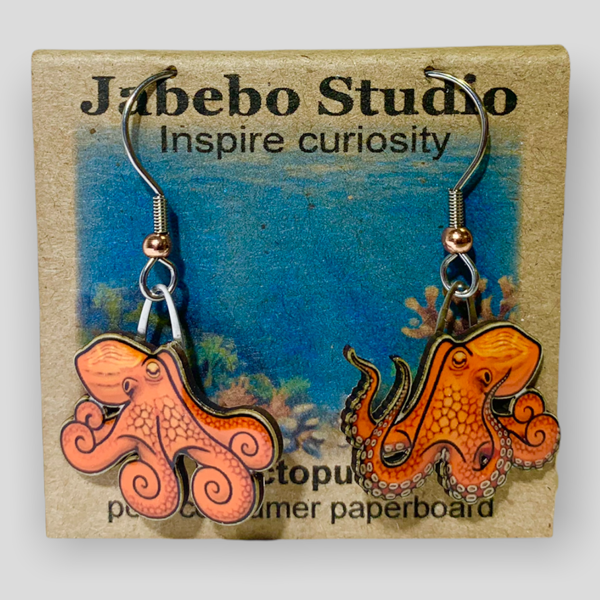 Picture shown is of 1 inch tall pair of earrings of the marine animal the Octopus.