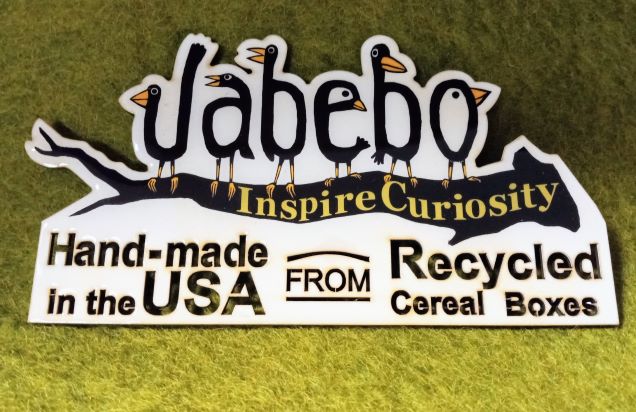 Jabebo Inspire Curiosity. Hand-made in the USA from Recycled Cereal Boxes. Signs sent to wholesale buyers.